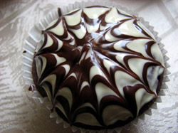 Halloween chocolate muffins with spider web